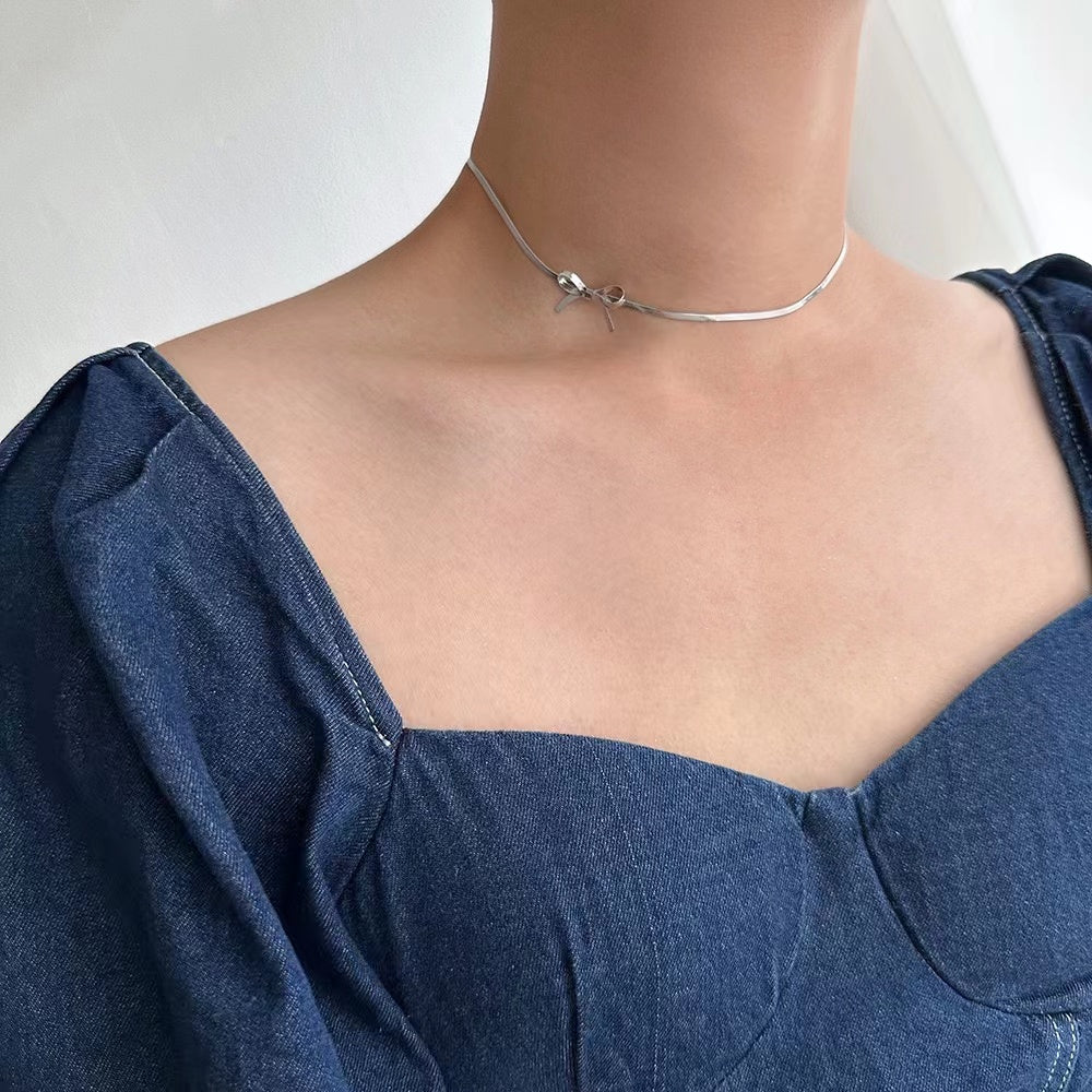 Elegant Silver Bow Pendant Necklace – Rust-Free Fashion by Rusty