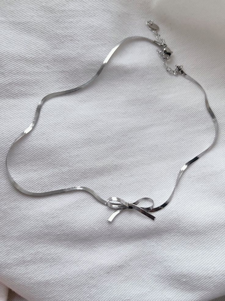 Elegant Silver Bow Pendant Necklace – Rust-Free Fashion by Rusty