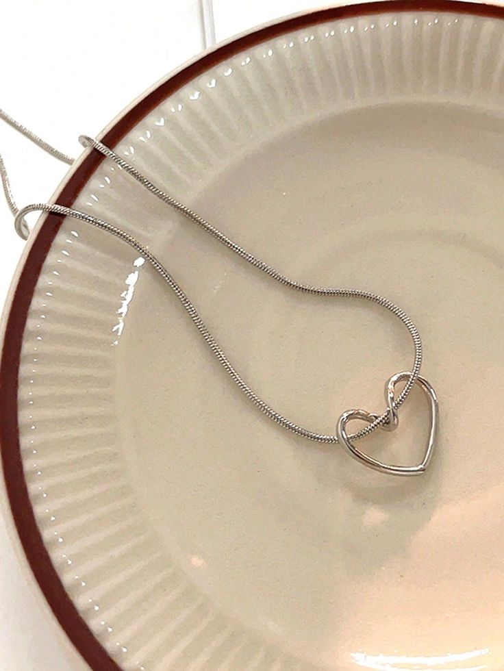 Minimalist Hollow Heart Pendant Necklace – Silver-Tone by Rusty