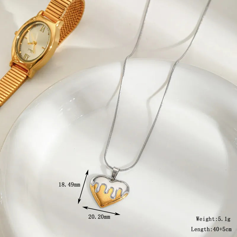 Two-Tone Dripping Heart Pendant Necklace – Modern Artistic Jewellery by Rusty