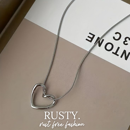 Minimalist Hollow Heart Pendant Necklace – Silver-Tone by Rusty