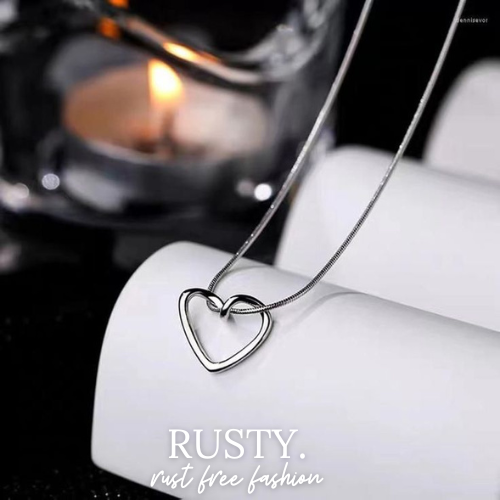Minimalist Hollow Heart Pendant Necklace – Silver-Tone by Rusty