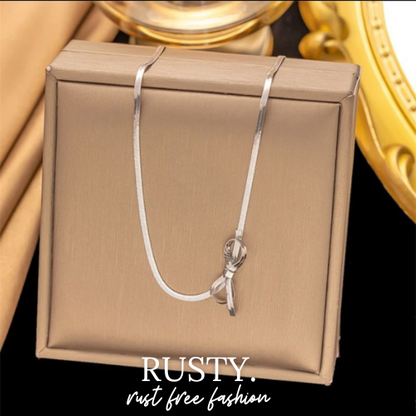Elegant Silver Bow Pendant Necklace – Rust-Free Fashion by Rusty