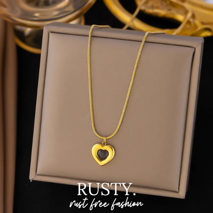 Golden Heart Pendant Necklace with Black Enamel – Rust-Free Fashion by Rusty