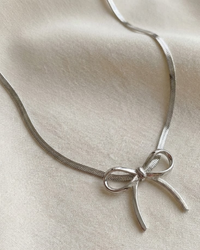 Elegant Silver Bow Pendant Necklace – Rust-Free Fashion by Rusty