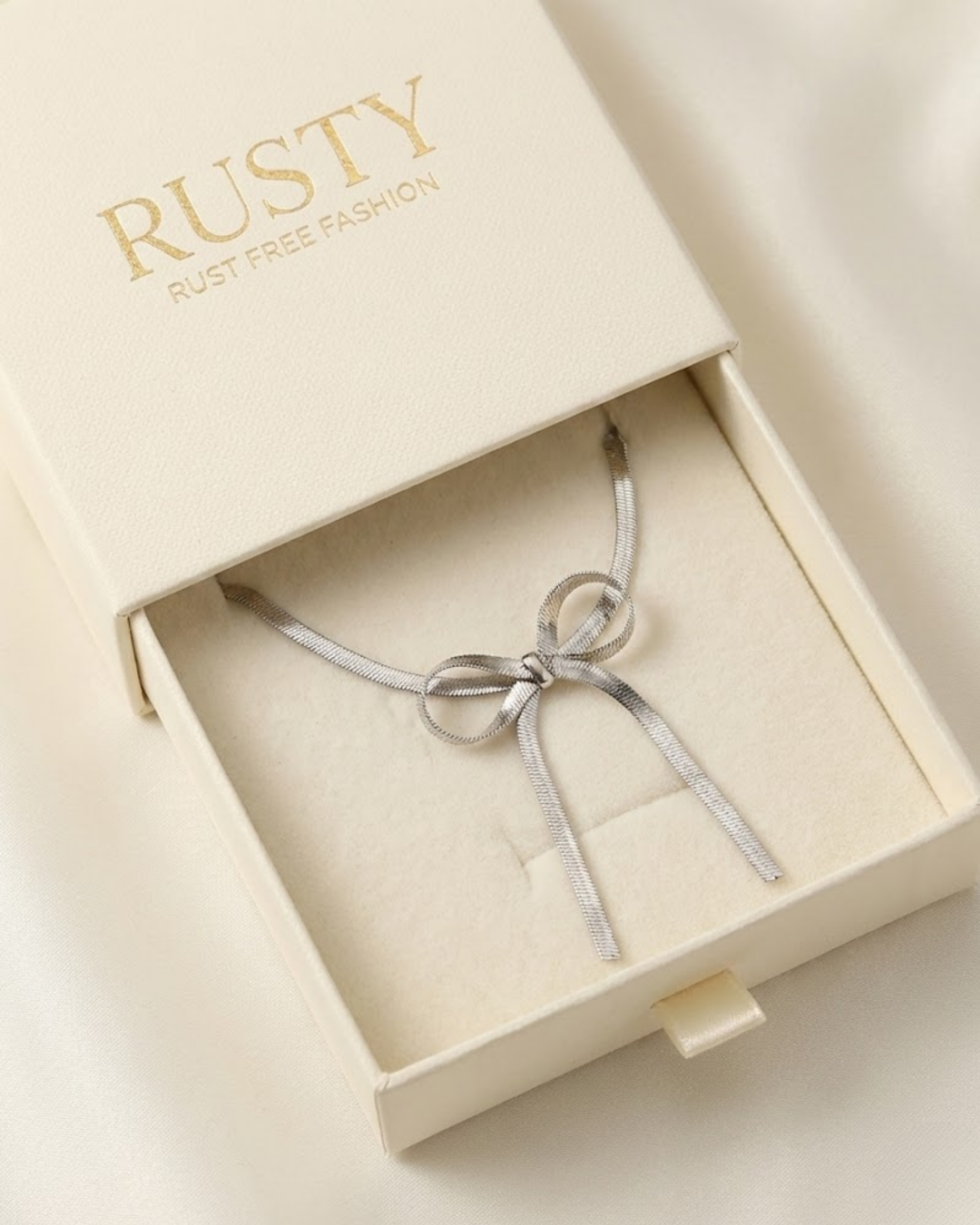 Elegant Silver Bow Pendant Necklace – Rust-Free Fashion by Rusty