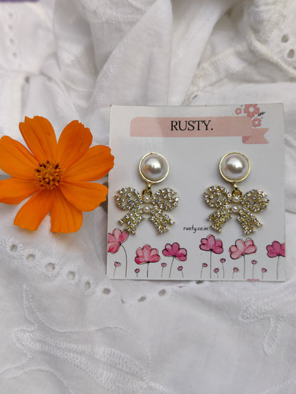 Rusty Pearl Bow Drop Earrings