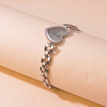 Rusty Silver Heart Charm Bracelet