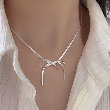 Elegant Silver Bow Pendant Necklace – Rust-Free Fashion by Rusty
