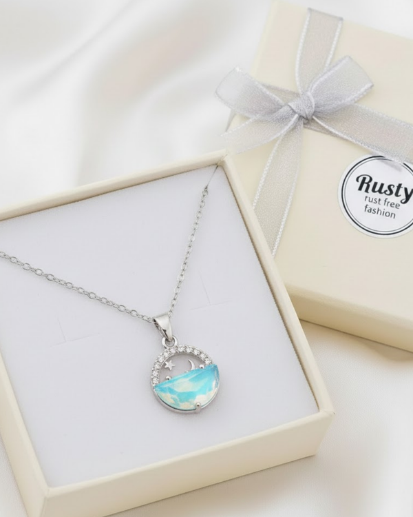 Moon & Ocean Wave Pendant Necklace – Silver-Tone Crystal Charm by Rusty