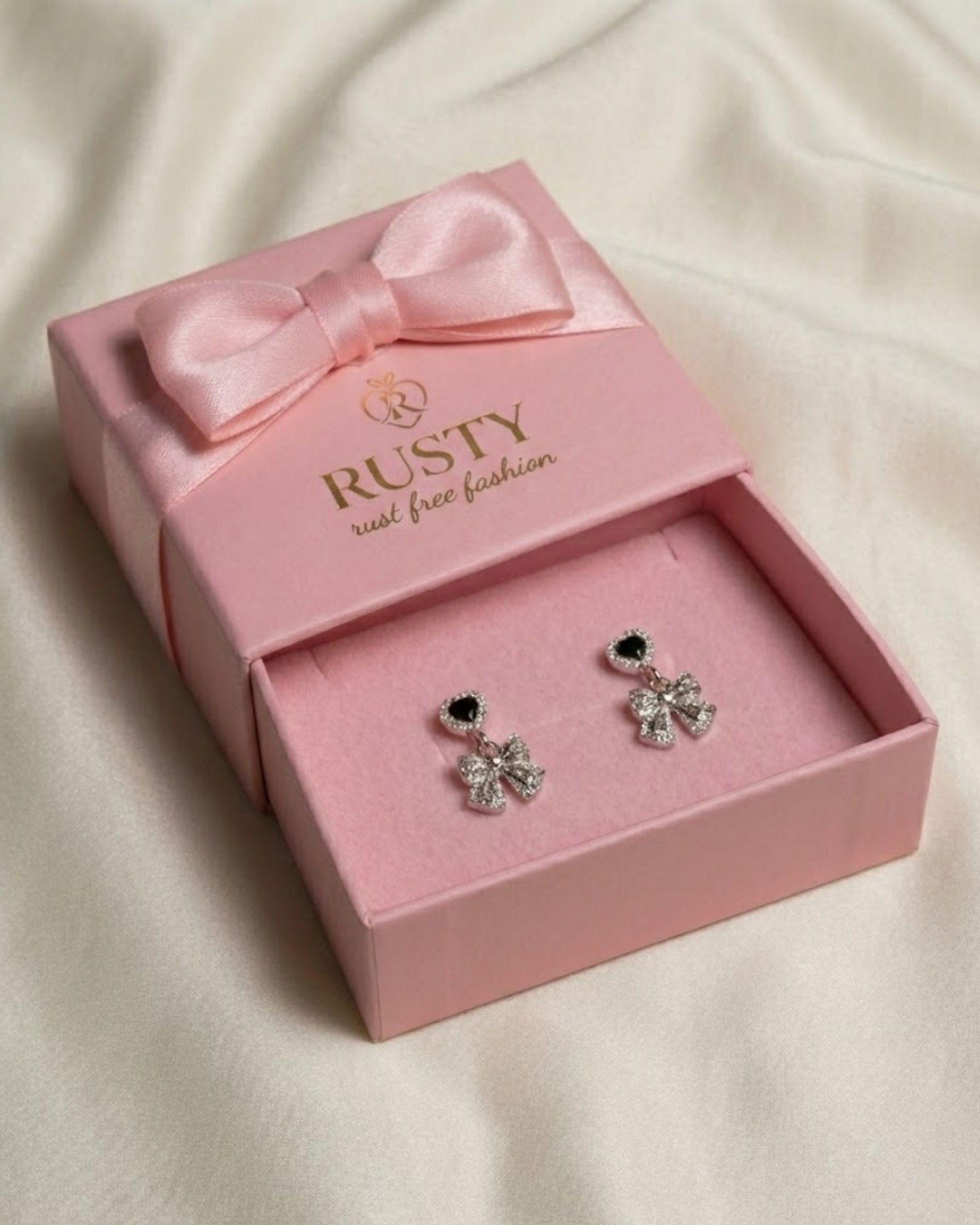 Rusty Black Heart Bow Drop Earrings