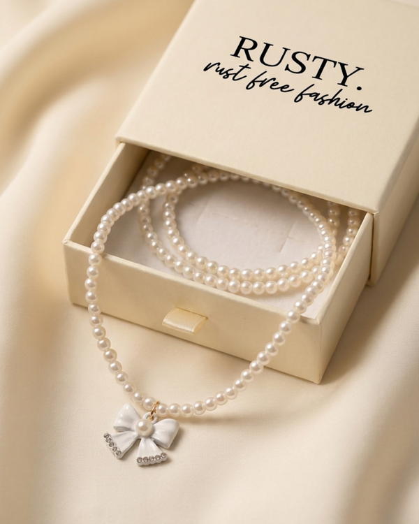 Rusty Pearl Bow Pendant Necklace