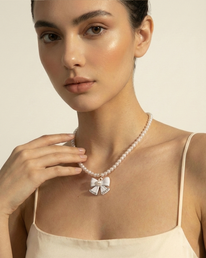 Rusty Pearl Bow Pendant Necklace