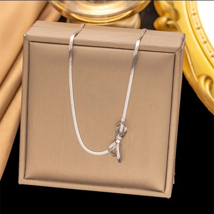 Elegant Silver Bow Pendant Necklace – Rust-Free Fashion by Rusty