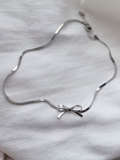 Elegant Silver Bow Pendant Necklace – Rust-Free Fashion by Rusty