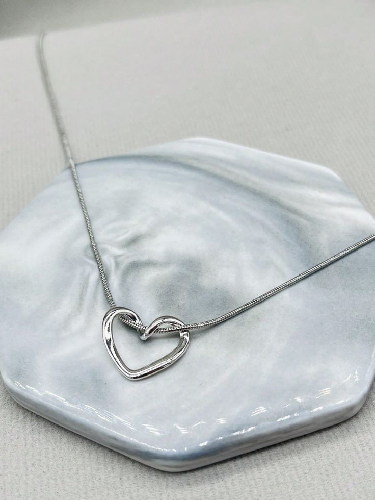 Minimalist Hollow Heart Pendant Necklace – Silver-Tone by Rusty