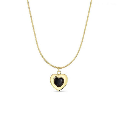 Golden Heart Pendant Necklace with Black Enamel – Rust-Free Fashion by Rusty
