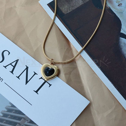 Golden Heart Pendant Necklace with Black Enamel – Rust-Free Fashion by Rusty